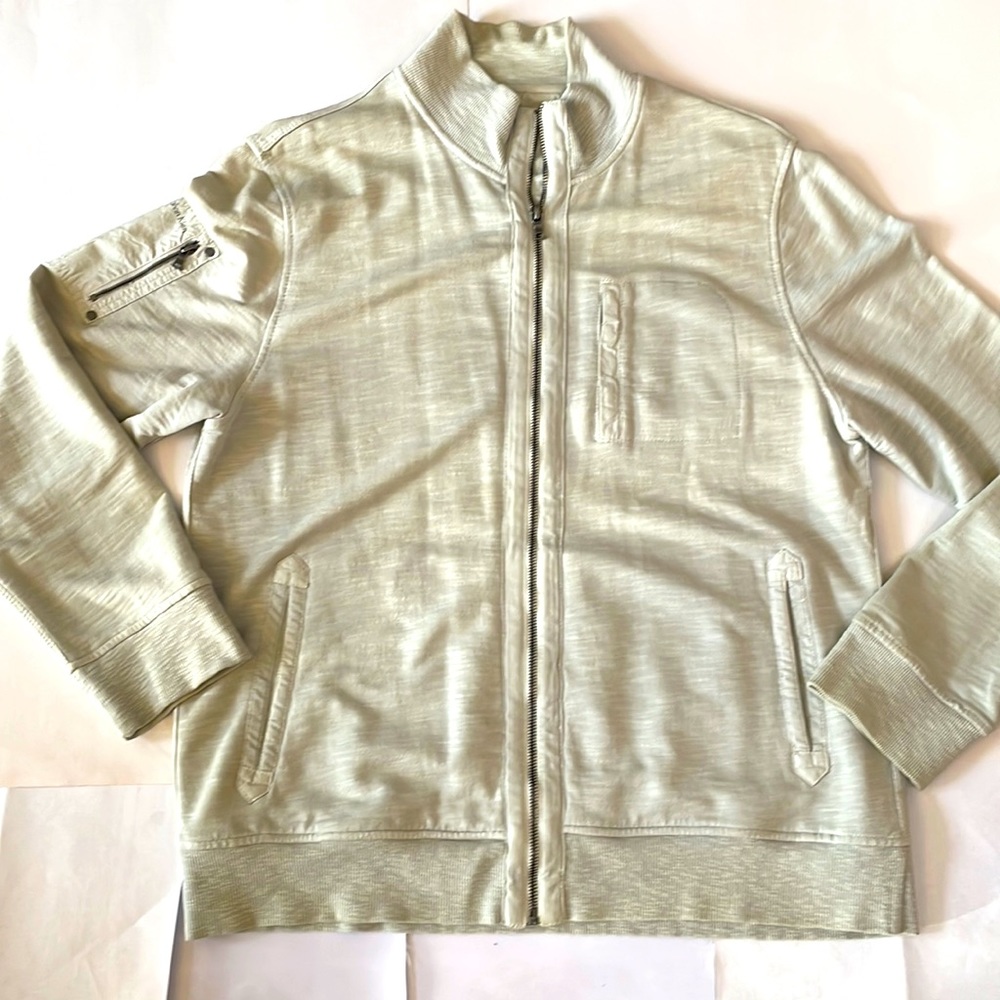 Men’s 90’s Calvin Klein track jacket, size large stone color, cargo pockets.